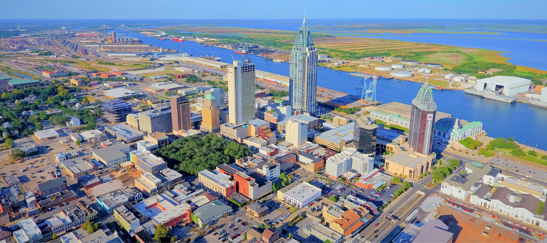 Aerial view of downtown Mobile, Alabama with the waterfront and skyscrapers